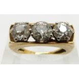 An 18ct gold ring set with three round cut diamonds each approximately 0.9, 0.7 and 0.7ct