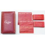 Cartier gold plated cigarette lighter with ribbed decoration, in original Cartier fitted box with