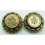 A pair of Victorian clip earrings with engraved ivy decoration