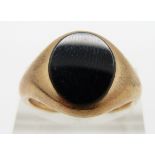 An 9ct gold ring set with onyx, 7.8g, size Q