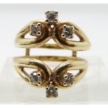 A 14k gold ring set with six diamonds, size I (the previous lot matches this ring which fits over
