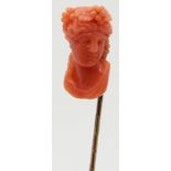 Victorian stick pin set with a carved coral cameo