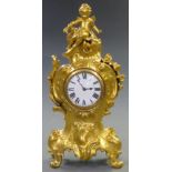Nineteenth century gilt brass French mantel clock, the enamel Roman dial with blue spade hands,