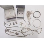 A collection of silver jewellery including necklaces, bracelets, earrings etc
