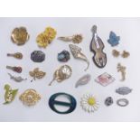 A collection of brooches including Miracle, Sarah Coventry, lucite, micro mosaic etc