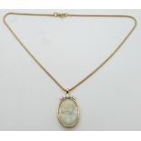 An 18ct gold necklace set with a carved opal panel depicting a young woman (7.7ct, Australia) set
