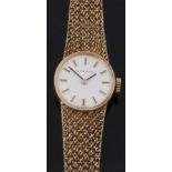 Certina 9ct gold ladies wristwatch with black hands, two-tone baton markers, silver dial and