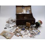 An amateur collection of UK and overseas coinage in a vintage suitcase