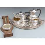 Plated tea set and galleried tray and an oak cased barometer