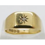 An 18ct gold ring set with a diamond, Chester 1928, 5.1g, size R