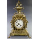 Nineteenth century gilt brass mantel clock with ivory coloured enamel Arabic dial, beetle and