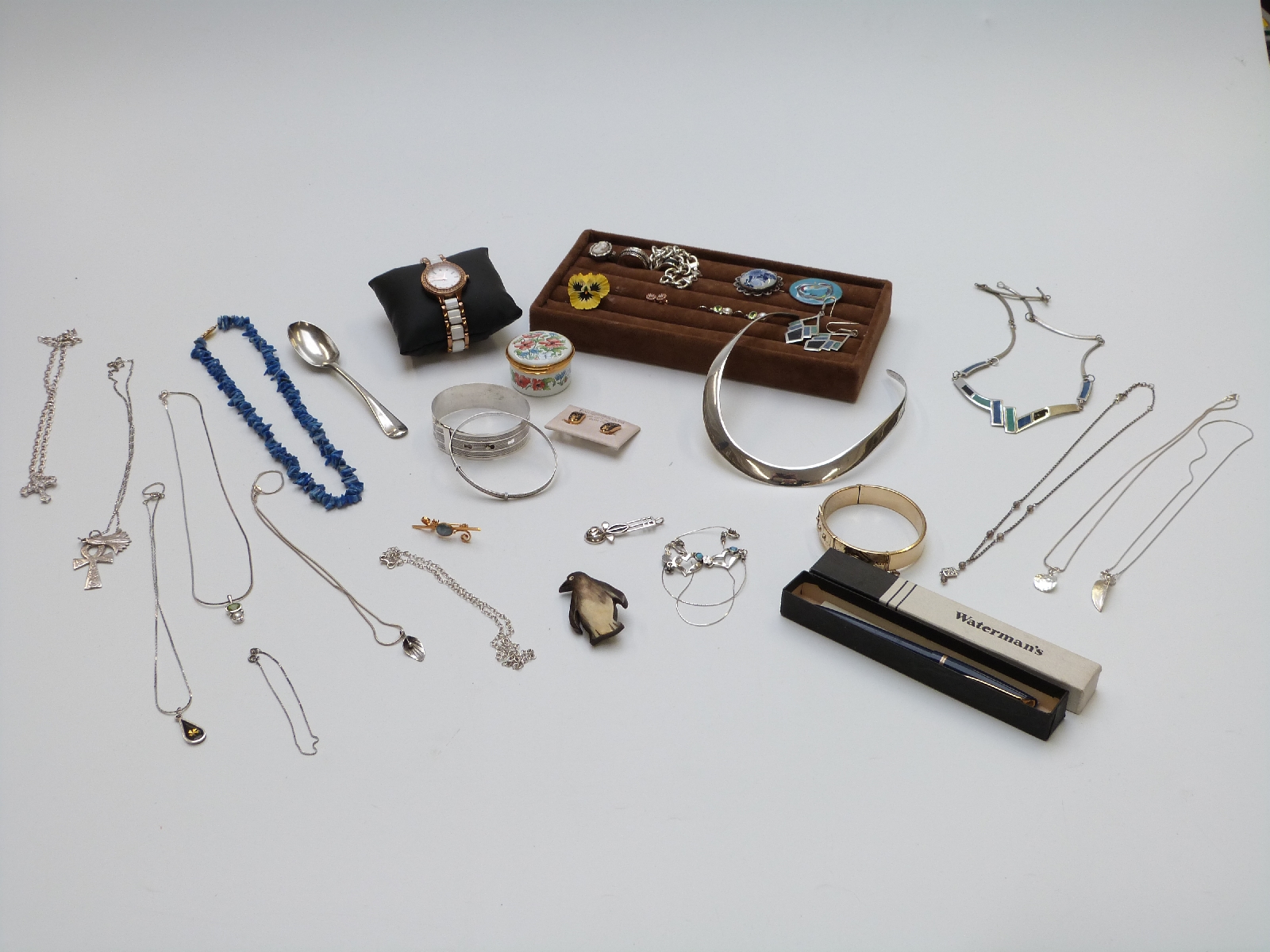 A collection of silver jewellery including rings, bracelet, earrings and necklace, a Waterman pen,