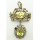 A Victorian pendant set with foiled yellow and clear paste, 4.5cm, in tooled leather box