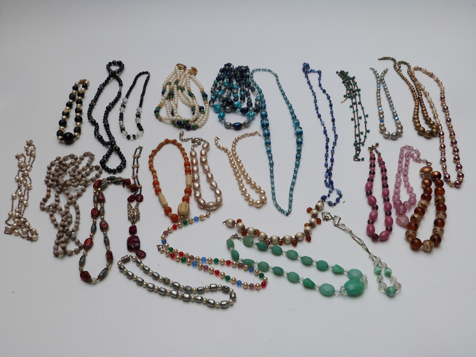 A collection of beads including glass, faux agate, French jet, Art Deco beads etc