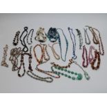 A collection of beads including glass, faux agate, French jet, Art Deco beads etc