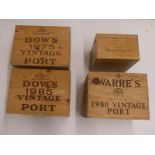 Four vintage port boxes/cases comprising Warre's 1980, Dow's 1985 and 1975 and Quinta de Vesuvio