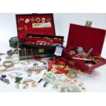 A large collection of costume jewellery including silver rings, beads, silver necklaces, brooches,