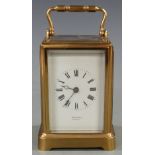 Late 19th / early 20thC brass carriage clock with Burman, Bristol to white enamel Roman dial and