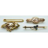 An 18ct gold brooch set with sapphires in a clover, a 9ct gold floral brooch, a 9ct rose gold brooch