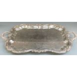 A large twin handled silver plated tray raised on four feet, length 75cm