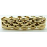 A 9ct gold bracelet by EJ Ltd, 73g