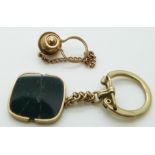 A 9ct gold key ring set with bloodstone and a 9ct gold stud