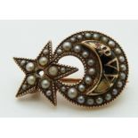 Victorian brooch set with seed pearls and enamel in a crescent and star design