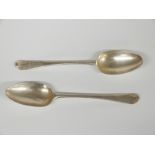 A pair of Georgian bottom hallmarked silver rat tail tablespoons, London circa 1760 but date