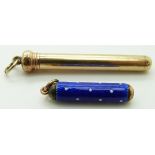 A yellow metal propelling pencil marked with an M and a propelling pencil set with blue enamel