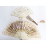 Two Chinese fans including a carved bone examples, largest 24cm, with embroidered decoration and