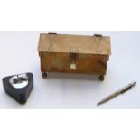 Victorian brass casket raised on ball and claw feet, triangular Ronson lighter and a hallmarked
