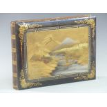 Japanese lacquered postcard album with mount Fuji landscape scene to cover and hard decorated pages,