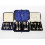 Three cased sets of hallmarked silver teaspoons, one with tongs, weight of silver 155g all in