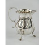 Elizabeth II hallmarked silver jug raised on three feet, Sheffield 1965 maker Francis Howard Ltd,