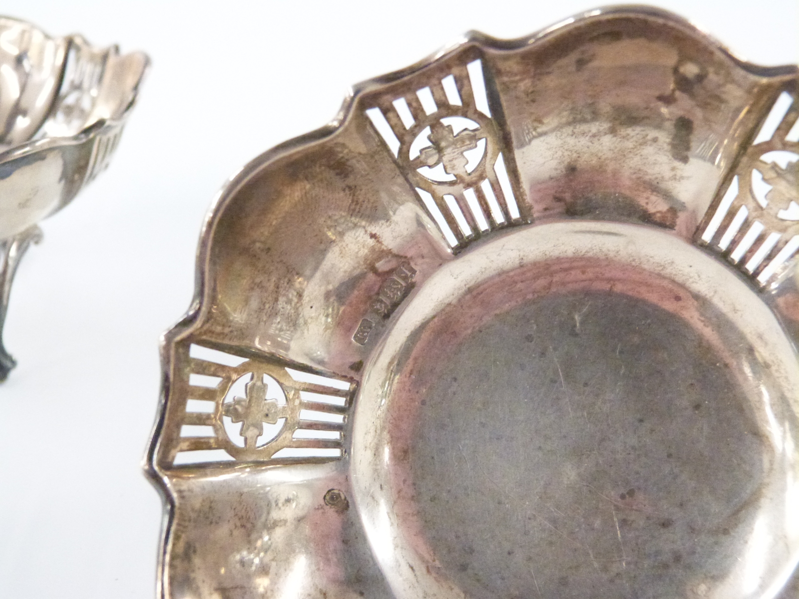 A pair of George V hallmarked silver pierced bonbon dishes, raised on three feet, Birmingham 1915 - Image 2 of 2