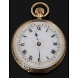 A 9ct gold keyless winding open faced pocket watch with gilt decorated and gem set white enamel
