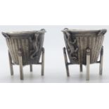 Pair of Chinese white metal salts formed as woven tapered baskets on stands with lizards to one