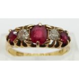 An 18ct gold ring set with two diamonds and red paste,  Birmingham 1890, size N