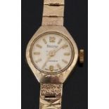 Regency 9ct gold ladies wristwatch with gold hands and baton markers, cream dial and signed 17 jewel