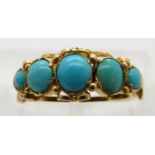 Victorian yellow metal ring set with graduated turquoise cabochons, size M