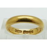 An 22ct gold wedding band, 4.7g, size J