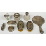 A quantity of hallmarked silver dressing table items with hammered decoration comprising hand
