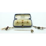 Three 9ct gold dress studs in fitted case, 9ct gold brooch set with an amethyst and seed pearls,