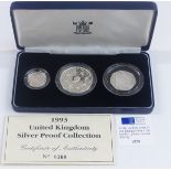 Royal Mint deluxe cased UK silver proof collection comprising a crown, one pound and fifty pence,