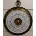 A circular 20thC aneroid barometer by Les Ateliers LM a Bordeaux, the white enamel dial with French,