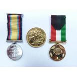 1979 gold full sovereign as part of a 'Behind Enemy Lines' Gulf War presentation miniature medal