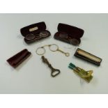 Three pairs of spectacles with gold plated rims and two cheroot holders