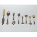 A quantity of 19thC hallmarked silver cutlery including four mustard spoons, 133g, and a silver