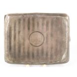 A curved hallmarked silver cigarette case. Chester 1912 maker Cohen & Charles, weight 98g.
