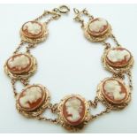 A 9ct gold bracelet set with shell cameos, 13g